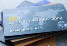 How Can You Protect Yourself from Credit Card Fraud? Pile of credit cards on table, closeup
